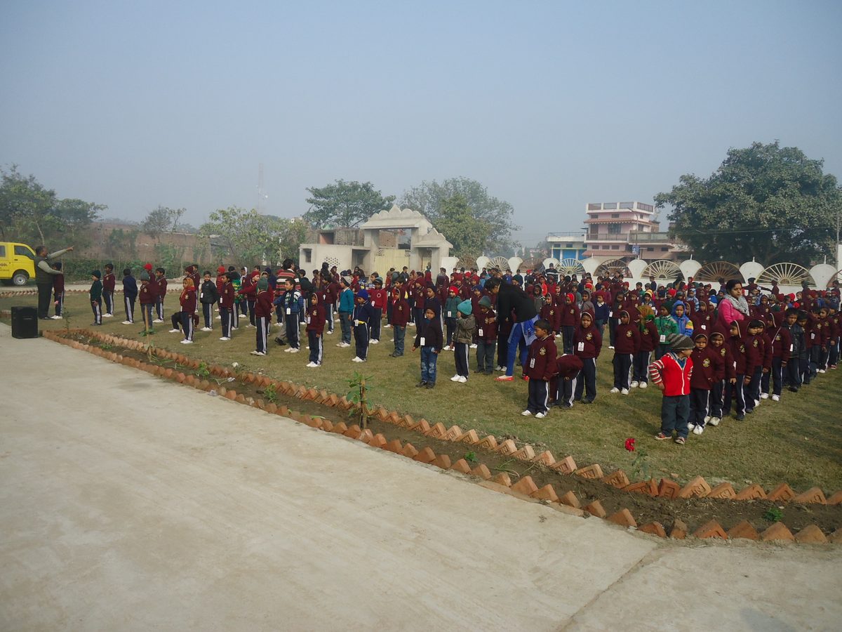 Students at morning assembly on the school ground
